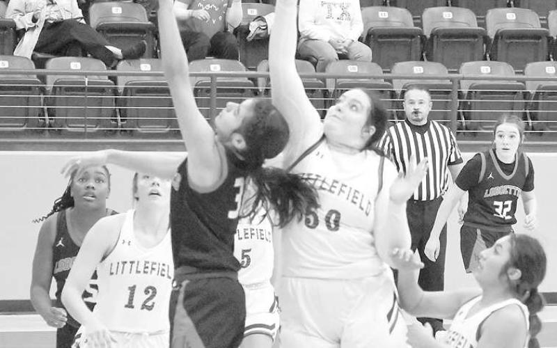 TOURNAMENT PLAY- Levelland Loboette Carly Tienda scored a lay-up in a 40-32 win over Littlefield. The Loboettes continued tournament play Thursday, December 29th in Littlefield against the Clarendon Lady Broncos. (Photo Courtesy of Derek Lopez)