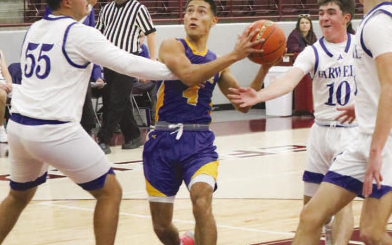EURO STEP - Whiteface Antelope Jeremiah Rendon weaved through traffic during the team’s game against Farwell in the Littlefield Tournament. (Staff photo by Aalijah Soliz)