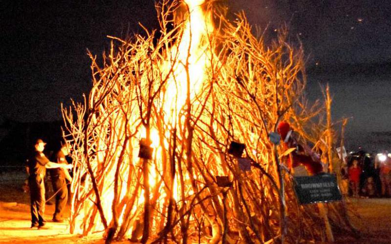 BONFIRE- Levelland firefighters lit the homecoming bonfire on Wednesday night at the My Hometown Revival . The evnet allowed community memebrs to come out and support the Lobos. The event had food trucks, a pep rally and ended with a bon fire. (Staff photo)