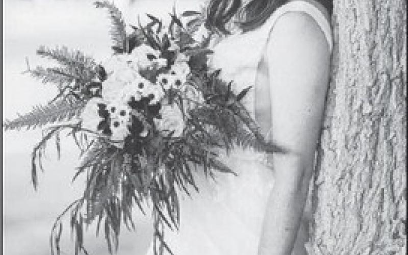 Mr. &amp; Mrs. Christian Lujan exchange wedding vows ..nee Elizabeth Greenhaw..