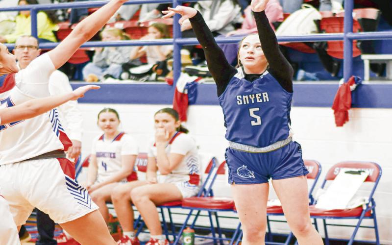 CORNER THREE - Smyer Lady Cat Ellie Nelson shoots a corner three-pointer during their district game this past Wednesday at Sundown High School. (Staff photo by Jentezen Smith)