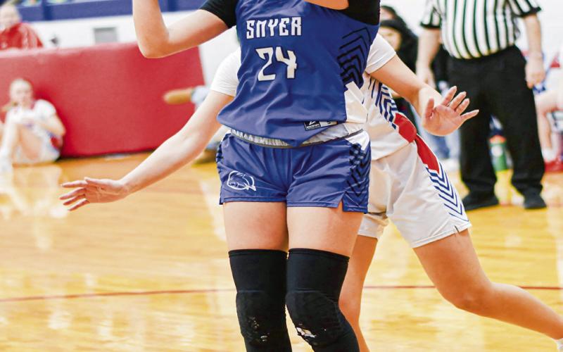 BASELINE JUMPER - Smyer Lady Cat Jada Hernandez shoots a baseline jump shot during their district game against Sundown this past Wednesday at Sundown High School. (Staff photo by Jentezen Smith)