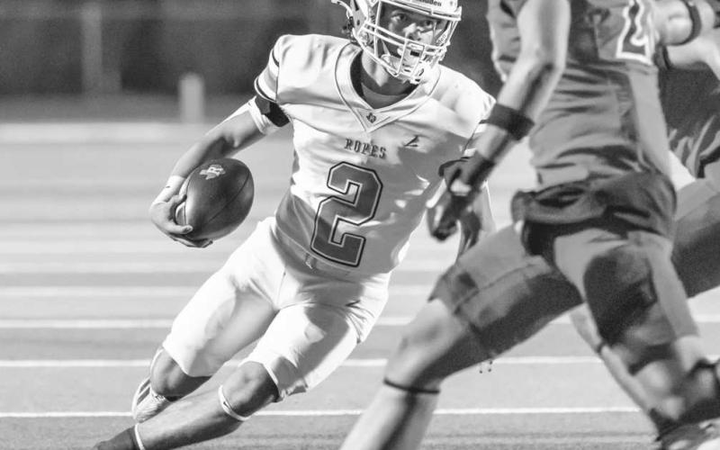 CUTBACK LANE - Ropes Eagle Mason Marmolejo ran two touchdowns in this past Friday night against the Seagraves Eagles on the road. Marmolejo racked up 114 rushing yards on 11 carries with two touchdowns and no fumbles on the night. (Photo courtesy of Donovan Martin)