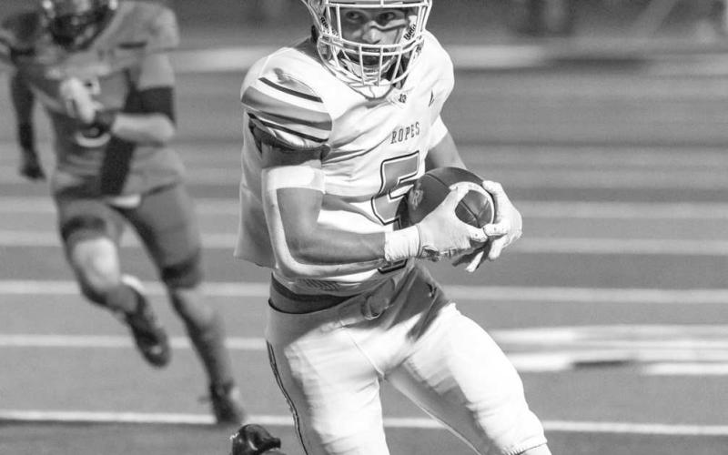CATCH IN STRIDE - Ropes Eagle Colton Mortensen caught the ball against the Seagraves Eagles this past Friday night where he ran it in for a touchdown. Mortensen had two catches for 52 yards and one touchdown in their contest. (Photo courtesy of Donovan Martin)