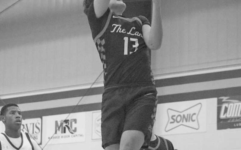TOO SMALL - Levelland Lobo Ethan Salazar backed down his defender in the paint for the strong lay-in during the team’s win this Thursday night. (Staff photo by Aalijah Soliz)