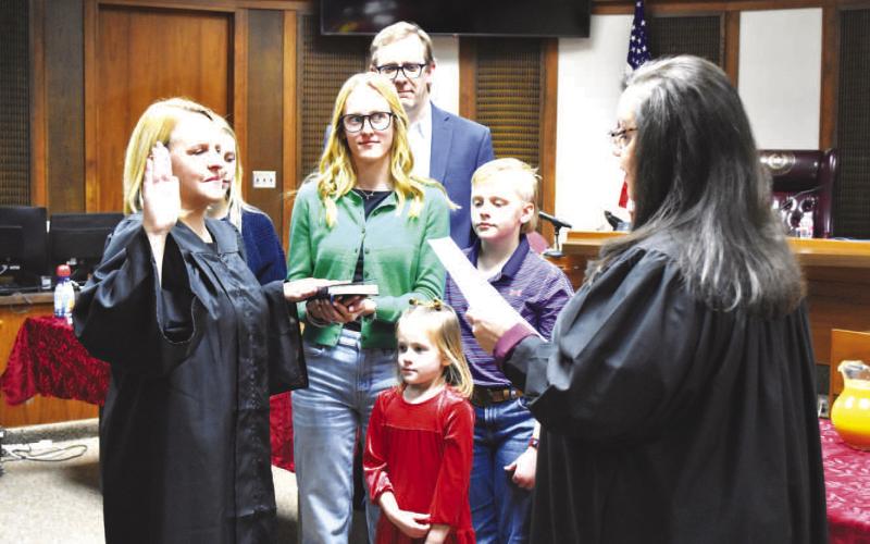 HORD SWEARING IN- The Honorable Anna Hord, joined by her friends, family and colleagues, was sworn in by County Judge Sharla Baldridge this past Tuesday after a judicial appointment by Gov. Greg Abbott to fill the unexpired term of retiring Judge Pat Phelan in the 286th District Court in Cochran and Hockley counties. (Photo by Lynda Work)
