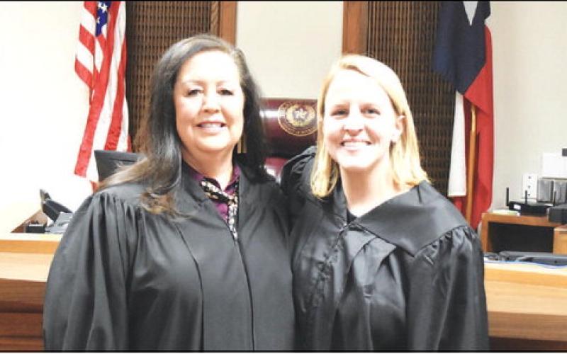 HISTORY MAKING- District Judge Anna Hord and Hockley County Judge Sharla Baldridge mark a first in the history as being the first two female judges of Hockley and Cochran county. Sworn by Judge Baldridge on Tuesday, Judge Hord begins her judicial appointment immediately. (Photo by Lynda Work)