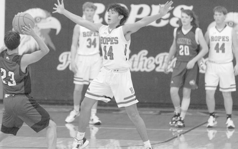 ZONE DEFENSE- The Ropes Eagles downed the visiting Smyer Bobcats 55-31 in UIL high school boys’ basketball action last week. Ropes defender EJ Mendez pressured the ball at the top of the key. (Photo Courtesy of Donovan Martin)