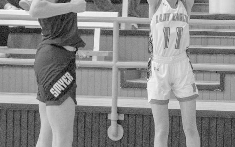 CORNER- The Ropes Lady Eagles downed the visiting Smyer Lady Cats 65-36 last week in UIL high school girls’ basketball action. Lady Eagle Allie Wilson put up a shot from the corner for three points. (Photo Courtesy of Donovan Martin)