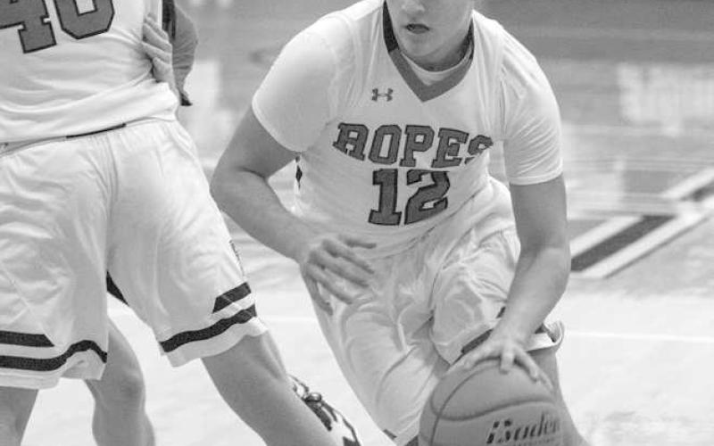 PICK PLAY- The Ropes Eagles downed the visiting Smyer Bobcats 55-31 in UIL high school boys’ basketball action last week. Nate Brooks used a pick from his teammate to get to the basket. (Photo Courtesy of Donovan Martin)