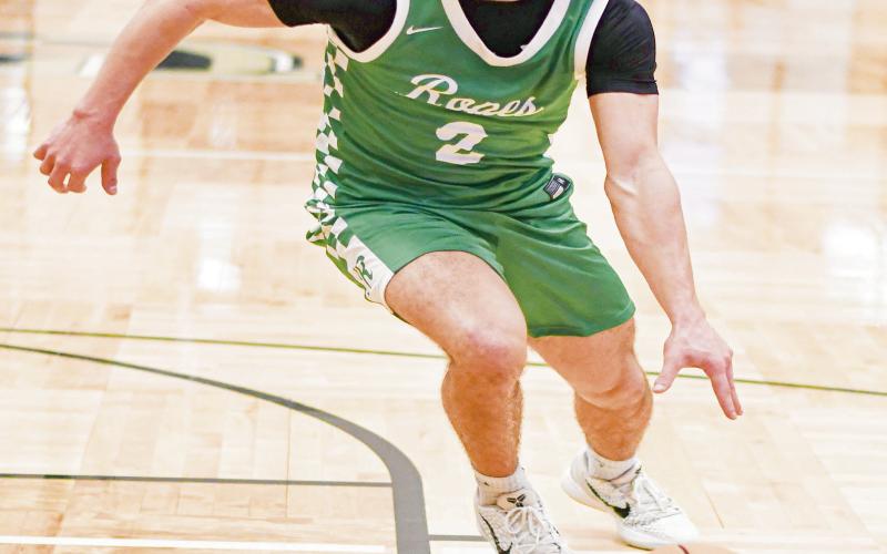 DRIVIN’ IT IN - Ropes Eagle Branson Simental drives into the paint to score during their game against Forsan this past Thursday at Lamesa High School. (Staff photo by Jentezen Smith)