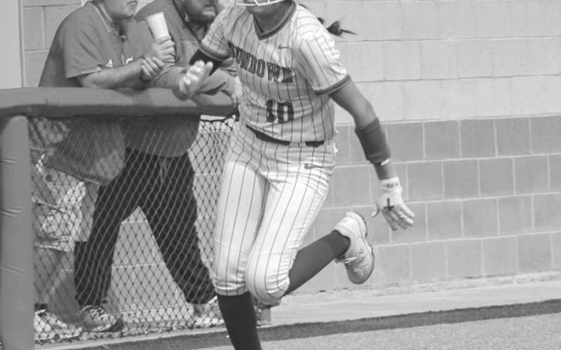 FULL SPEED - Sundown Roughette Araceli Ibarra ran full speed to home plate during the team’s game against the New Deal Lady Lions March 29 at home. (Staff photo by Aalijah Soliz)