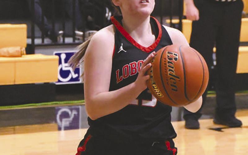 SHOT ATTEMPT- The sixth ranked Levelland Loboettes continued their district dominance with a road win in Snyder, 67-46, against the Lady Tigers Friday. Loboette Maddie Stafford attempted a lay-up during the game. (Staff Photo by Dom Puente)