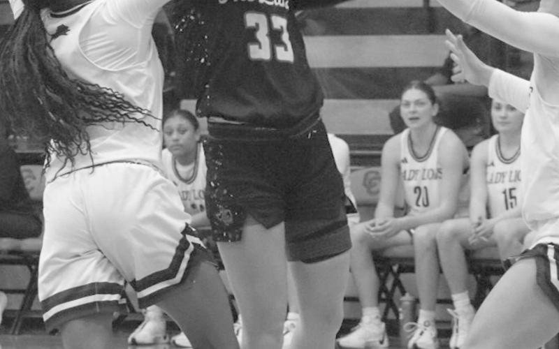 POWER THROUGH - Levelland Loboette Presley Smith layed the ball up through the contact during the team’s game in Colorado City this past Monday night. (Staff photo by Aalijah Soliz)