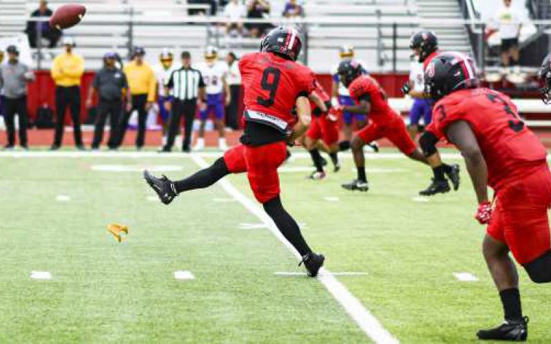 T IME FOR KICKOFF – The Levelland Lobos kick off the ball as they prepare to go on defense first for their football matchup against Pecos at Lobo Stadium this past Friday night. The Lobos would go on to win 41-21. (Staff Photo by Jentezen Smith)