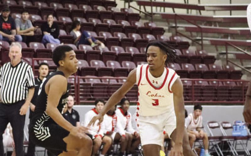 BLOW BY - Levelland Lobo Eryk Jones blew past the Bushland defense during the the teams game last week in the Littlefield Tournament. (Staff photo by Aalijah Soliz)