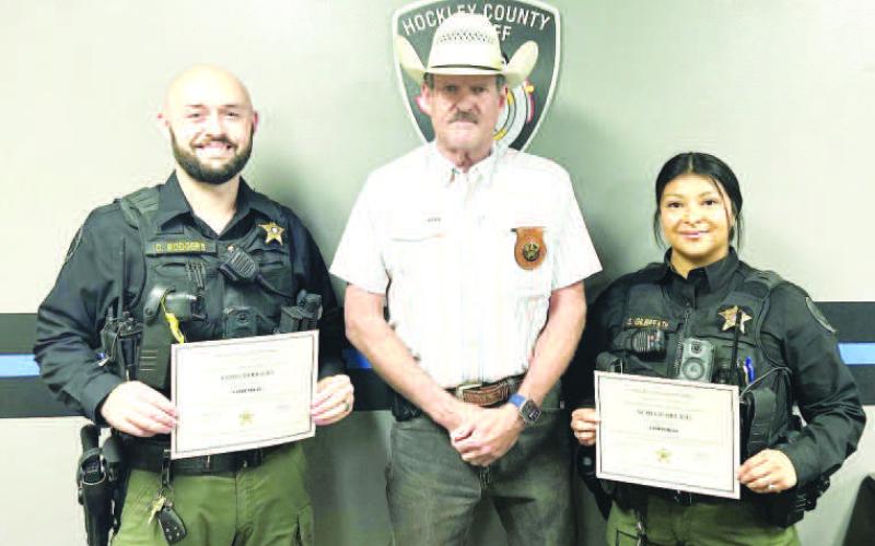 SHERIFF OFFICE PROMOTIONS - The Hockley County Sheriff's Office announced the creation of new Patrol Corporal positions as a part of its continued commitment to strong leadership and professional growth. Shown with Sheriff Chris Wischkaemper, Corporal Chris Gilbreath and Corporal Star Gilbreath each received promotions and bring a wealth of law enforcement experience, professionalism and dedication to serving Hockley County.