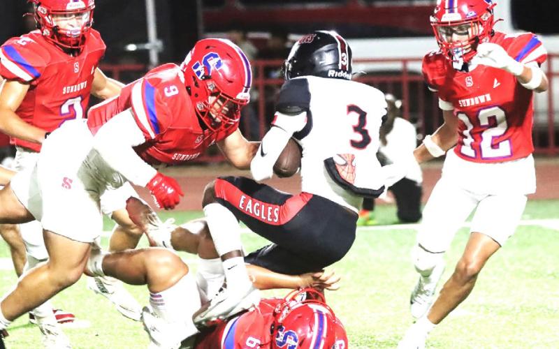 Sundown Roughneck defense brings down Seagraves ball carrier. (Sundown ISD photo)