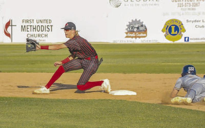 PLAY AT TWO- Lobo second baseman Wyatt Baccus reeled in a throw from catcher Rusty Johnson. The Lobos were swept by Stephenville in the bi-district round of the playoffs. Levelland finished the season 18-14. (Staff Photo by Dom Puente)