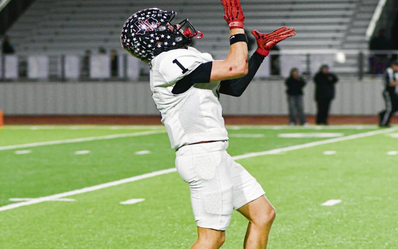 BRING IT IN “BROG” - Levelland senior Kaden Brogden returns a Seminole kick during their playoff football game this past Friday at Frenship High School. Brogden would lead the Lobos in receiving yards with 87 on seven receptions, adding a touchdown catch as well. (Staff photo by Jentezen Smith)