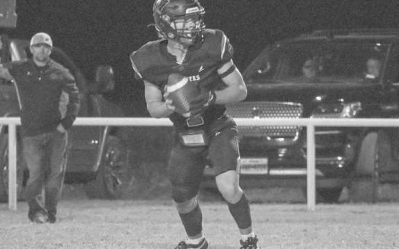 LATERAL - Whitharral Panther Brolin Kennedy passed the ball back to his teammate during the team’s game against Anton last Friday night. (Staff photo by Aalijah Soliz)