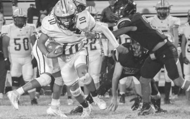 STRONG RUNNING - Anton Bulldog was running hard while Whitharral Panther Damien Rodriguez was bringing him down last Friday night. (Staff photo by Aalijah Soliz)