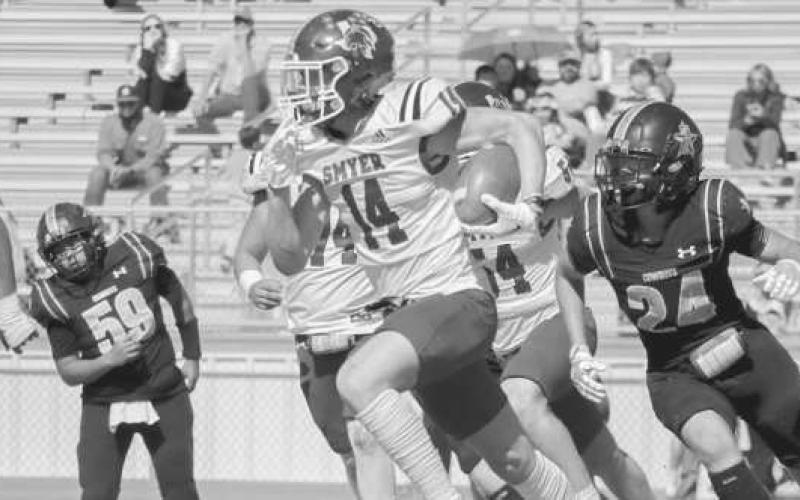 JET SWEEP - Smyer Bobcat Rylan Smith turned the corner on the Plains defense last Friday afternoon on the road. (Staff photo by Aalijah Soliz)
