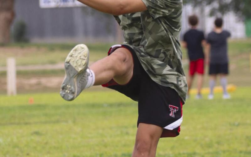 PUNT FORM - Ropes Eagle Rylan Ketchersid punted the ball during the Ropes Eagle Football Camp this past Monday at the Ropes Football Field. (Staff photo by Aalijah Soliz)