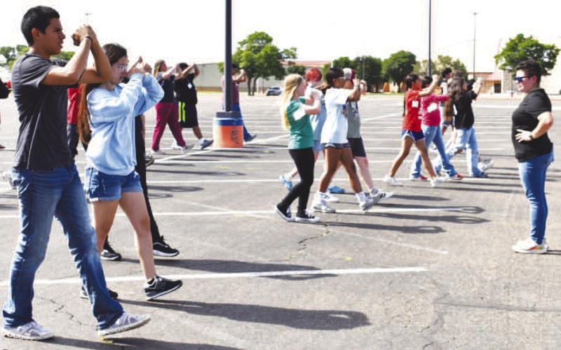 MORNING MARCHING – Pictured are students practicing marching fundamentals during the SPC band camp. The five-day camps included middle school band, high school leadership and high school drum major camps. (Staff photo by Ada Niederhauser)