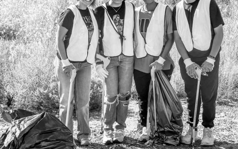 Community members of Levelland volunteered their time Saturday morning for the Keep Levelland Beautiful Community Wide Clean-Up Day. Pictured from left to right are: Cadence Trevino, Kassidy Padilla, N’ya Washington and Victor Reyes. (Staff photo by Essence Childres)