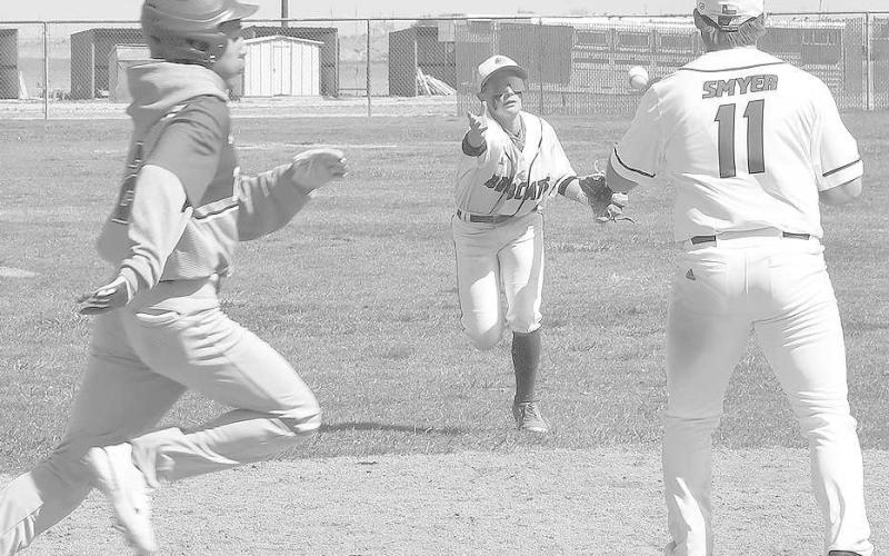 4-3 ROLL UP- Austin Martinez made the 4-3 play to get a Tahoka runner out at first in a 5-4 Smyer Bobcat home win over Tahoka in UIL District 4-2A High School Baseball action last Saturday. (Photo Courtesy of Jay Kelley)