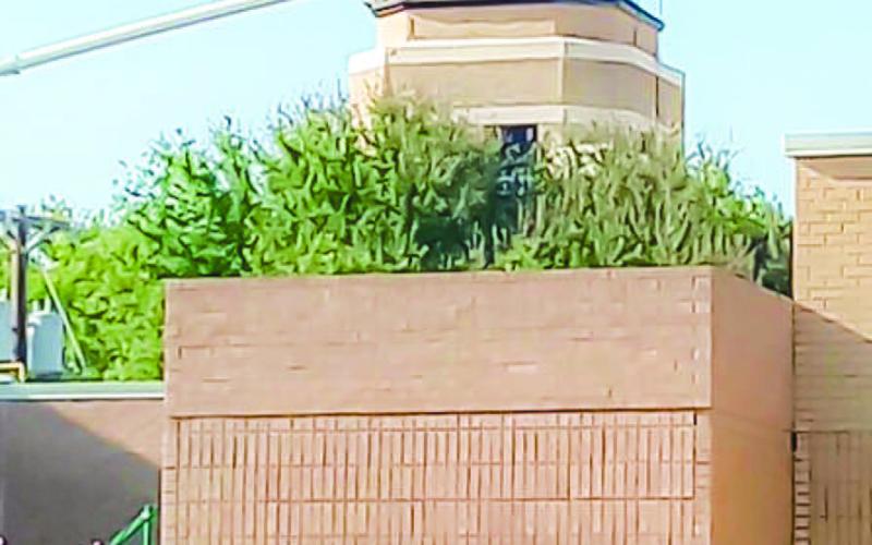 A NEW CHURCH STEEPLE - Pictured is a construction crew finishing the installation of a new church steeple at the First Baptist Church in Levelland located along Houston Street.