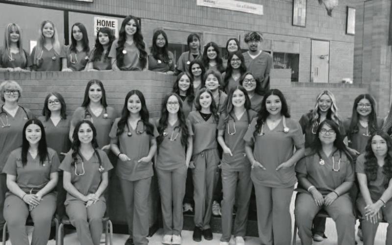 PCT STUDENTS RECEIVE SCRUBS