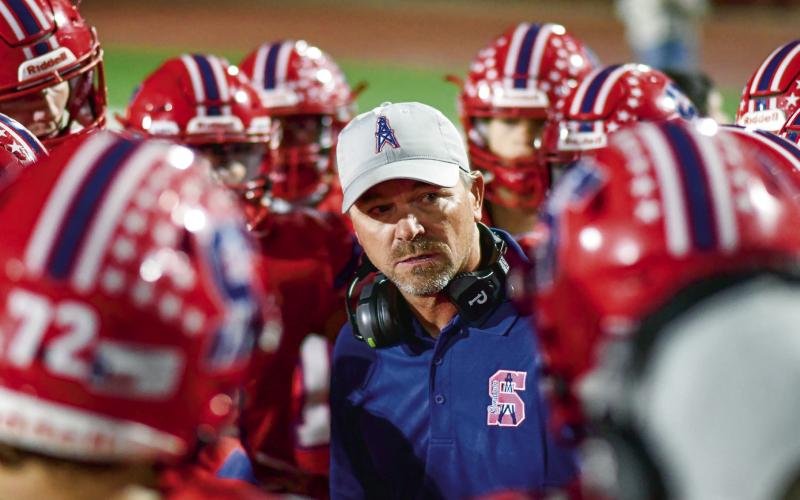 IT’S TIME TO LOCK IN - Sundown Head Football Coach Brannon Rodgers instructs his players to lock in during a third-quarter time out during their game against Plains this past Friday night at Slaughter field. Coach Rodgers would lead the Roughnecks to a 35-7 victory, improving his team to 3-4 overall and 2-0 in district play this season. (Staff photo by Jentezen Smith)