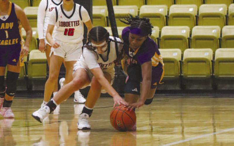 DIVINGATTEMPT - Levelland Loboette Leilani Sanchez made the diving effort to get the jump ball during the team’s game against Pecos this past Thursday in Andrews. (Staff photo by Aalijah Soliz)