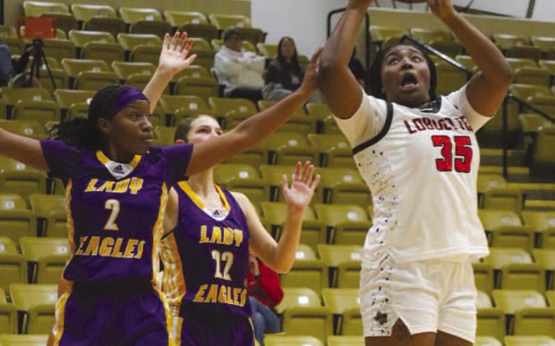 PUTBACK - Levelland Loboette Sydnii Joyce grabbed the offensive rebound and shot it again for the easy two points against Pecos this past Thursday. (Staff photo by Aalijah Soliz)