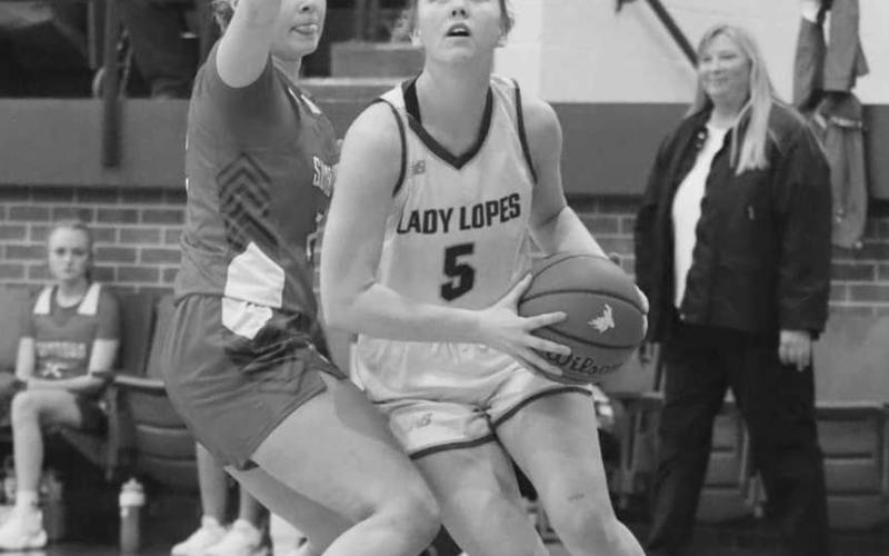 DRIVE BY - Whiteface Lady Lope Jaedyn Rector drove past her defender during the team’s game against Sundown at home during district play. (Photo courtesy of Holly Crutcher)