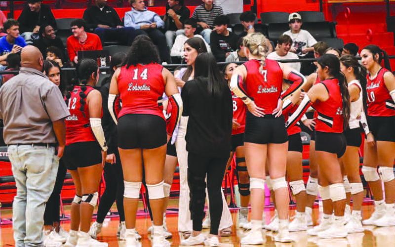 TIMEOUT - The Levelland Loboettes utilized a much needed timeout to slow the momentum of the Plains Cowgirls offense during this past Tuesday matchup at home. The Loboettes would drop three-straight sets against the Cowgirls. (Staff photo by Aalijah Soliz)