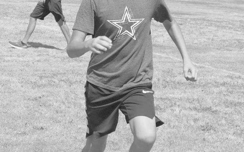 CONDITIONING - Morton student Aidyn Ramirez went all out to finish his running at the Morton ISD Football Camp. (Staff Photo by Aalijah Soliz)