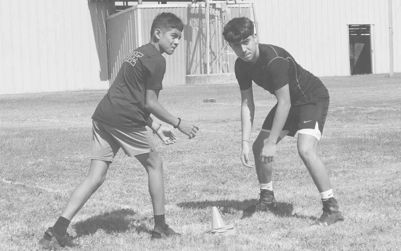 AT THE READY- Morton athletes Bryson Sanchez and Luis Aguirre were getting a good rep in against each other while playing Wide Receiver and CornerBack during Morton’s annual football camp. The Morton Coaching Staff covered all phases of the game. (Staff Photo by Aalijah Soliz)