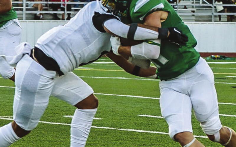 DOWNHILL - Levelland Lobo Isaiah Avendano ran downhill fast on the Idalou wide receiver to stop him from getting any more yards in the team’s contest last Friday. (Staff photo by Aalijah Soliz)