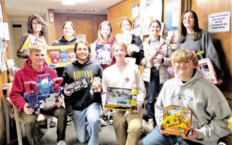 LHS YELL members teamed up with NHS members to collect toys for LOVE Levelland as their December community service project. The two organizations donated nearly 100 toys and delivered toys last week to help make Christmas brighter for others. YELL and NHS sponsor Cristal Isaacks, Paula Castellano, Krystal Bunker, Nathan Ellis, Micheal Canon, Brady Houston and Chase Eller.