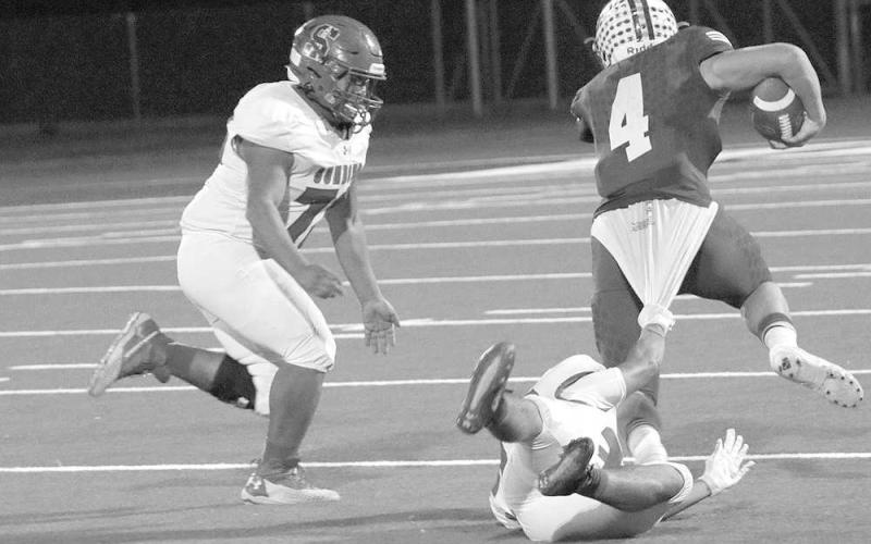 HANGING ON- Roughneck Isaiah Flores hung onto a Stratford ball carrier and Dakota Golightly made the tackle. The Sundown Roughnecks’ football season came to an end Thursday night in Hereford with a 498 loss to the defending Division 2 State Champion Stratford Elks. (Photo Courtesy of Chris Bratcher)