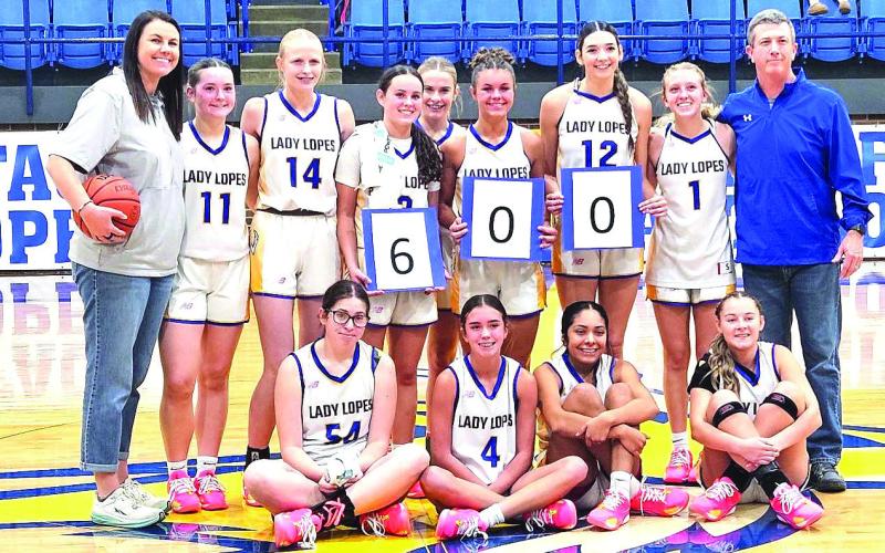 600 CAREER WINS MILESTONE - Whiteface Girl’s Head Basketball Coach Jason Blankenship earned his 600th career win by beating Stanton 68-25 at home this past Monday. The win moves the Lady Lopes to 7-2 overall this season. They’ll be back in action on Dec. 2. at 5 p.m. on the road against New Deal. (Staff photo by Jentezen Smith)