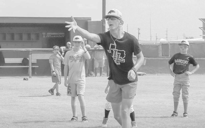 NICE THROW - Levelland baseball player Wyatt Baccus helps out with the Levelland Baseball Camp on June 30. (Staff Photo by Aalijah Soliz)