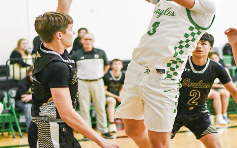 34-POINT NIGHT - Ropes senior forward Kade Franklin puts up a shot in the paint amidst Sudan defenders during their game this past Tuesday night in Ropes. Franklin would end with 34 points on the night. (Staff photo by Jentezen Smith)