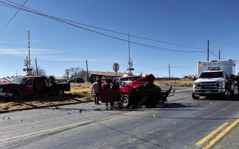 HIGHWAY WRECK - Around 1 p.m. Monday, a two-vehicle wreck occurred at the intersection of Houston Street and Highway 114. Levelland Police officers, Levelland EMS and Levelland Fire Department were on scene to assist the occupants of both vehicles and direct traffic. (Staff Photo by DeeLaine Ruiz)