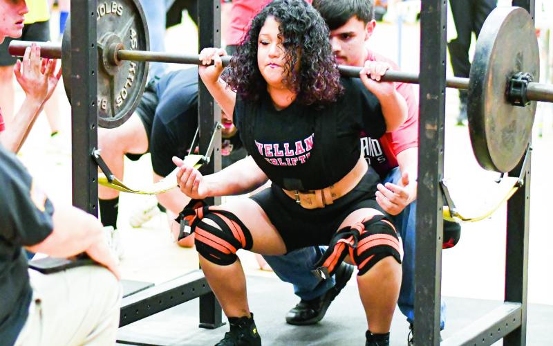 FEEL THE BURN - Levelland’s Nataly Morales does a back squat with perfect depth during the Levelland Invitational powerlifting meet this past Saturday at Levelland High School. (Staff photo by Jentezen Smith)