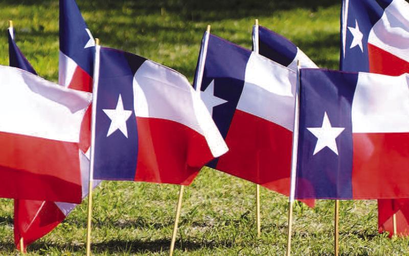 FALLEN OFFICERS - Every year the community looks forward to the annual SPC Peace Officer Memorial which is held in April. Every year, small State of Texas and United States flags are placed in the front lawn entrance of the SPC campus in Levelland where the event is held. Each flag represents a fallen officer in Texas or across the nation over the past year. (Staff photo by Dom Puente)