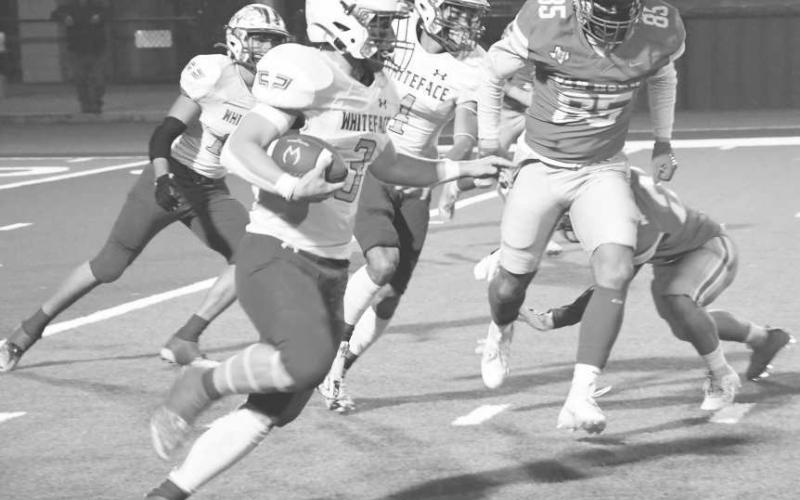 OUT OF HERE - Ethan Kauffman had 13 carries for 255 yards and five touchdowns for the Whiteface Antelopes last Friday in a 58-8 win over the Van Horn Eagles in UIL Class 1A-1 bi-district high school football action in Rankin. Kauffman passed 2,000 yards on the season. The Antelopes will face Borden County on Friday in Slaton at 7 p.m. (Photo by Jay Kelley)